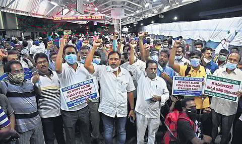 Steel plant workers gather at Duvvada Railway station in Visakhapatnam to board AP Express to New Delhi on Saturday I G Satyanarayana