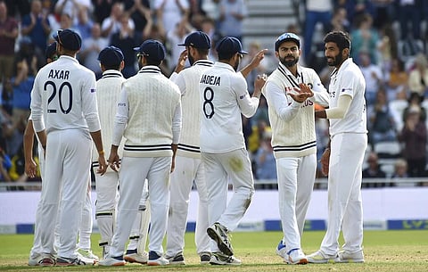 India's Jasprit Bumrah and teammates celebrate the dismissal of England captain Joe Root during the fourth day of first test cricket match between England and India. (Photo | AP)