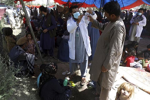 Internally displaced Afghan women from northern provinces, who fled their home due to fighting between the Taliban and Afghan security personnel, receive medical care in Kabul. (Photo | AP)