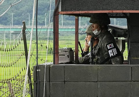 South Korean army soldiers stand guard at a military post at the Imjingak Pavilion in Paju, South Korea, near the border with North Korea. (Photo | AP)