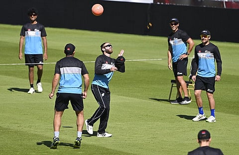 New Zealand captain Kane Williamson, centre, heads the ball during a warm up at a nets session. (File Photo | AP)