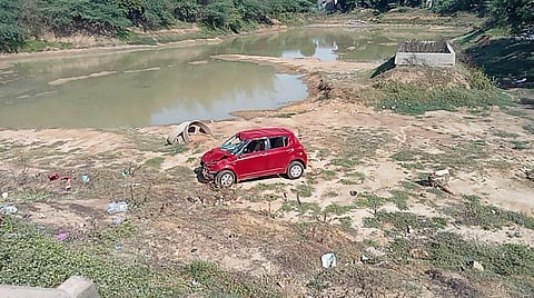 The crowd reportedly grew angry once they realized the driver had escaped. The car's windshield and windows were broken and the mob pushed the car off the road, towards a pond. (Photo | ENS)