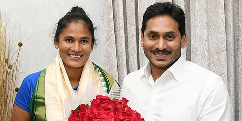 Andhra Pradesh Chief Minister YS Jagan Mohan Reddy felicitates hockey player E Rajani. (Photo| EPS)