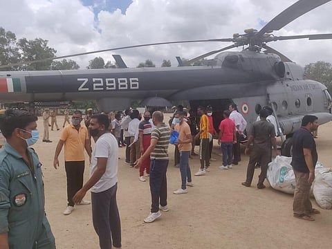 ndian AirForce  helicopters carry out airlift of essentials and relief supplies for the population of #Jalaun district, Uttar Pradesh. (Photo | Twitter)