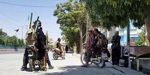 Taliban fighters patrol inside the city of Ghazni, southwest of Kabul, Afghanistan, Thursday, Aug. 12, 2021. Ghazni was the 10th provincial capital to fall for the Taliban in last week. (Photo | AP)
