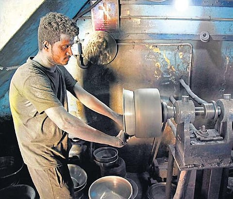 A man making utensils at Chennai’s Pattalam, which has emerged a hub of cottage industry of utensils