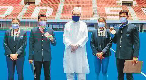 Chief Minister Naveen Patnaik on Wednesday felicitated all the four hockey players from Odisha for their stellar performance in the Tokyo Olympics. (Photo | Express)