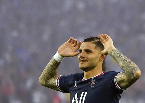 PSG's Mauro Icardi celebrates after scoring his side's opening goal against Strasbourg, at Parc des Princes stadium in Paris, Aug. 14, 2021.  (Photo | AP)