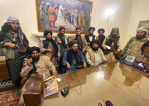 Taliban fighters take control of Afghan presidential palace after the Afghan President Ashraf Ghani fled the country. (Photo | AP)