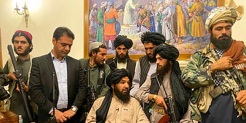 Taliban fighters take control of Afghan presidential palace after the Afghan President Ashraf Ghani fled the country, in Kabul, Afghanistan, Sunday, Aug. 15, 2021. (Photo | AP)