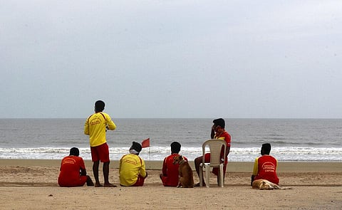 Life guards sit at Mumbai's Juhu Beach (File Photo | AP)
