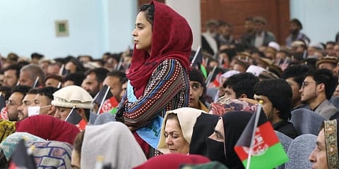 Afghan citizens at a March 2021 rally in Kabul to support peace talks between the Taliban and the government. Haroon Sabawoon/Anadolu Agency via Getty Images