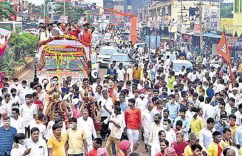Union Minister Bhagwanth Khuba takes out a rally in Bidar on Monday