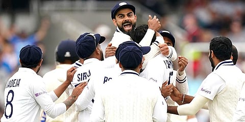 India's Virat Kohli, top, celebrates the wicket of England's Jonny Bairstow after a video review during day five of the Second Test match at Lord's, London. (Photo | AP)