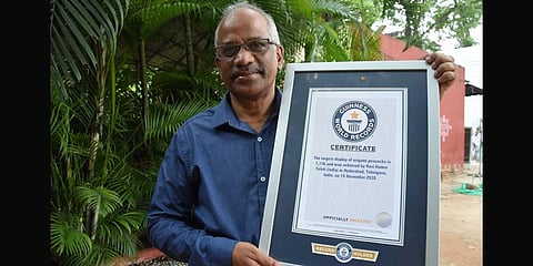 Ravi Kumar Toleti, a math teacher, displays his certificate of recognition from the Guinness World Record  | RVK Rao