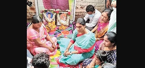 Sharmila sits with family members of Sunil Naik, who died by suicide, on Tuesday