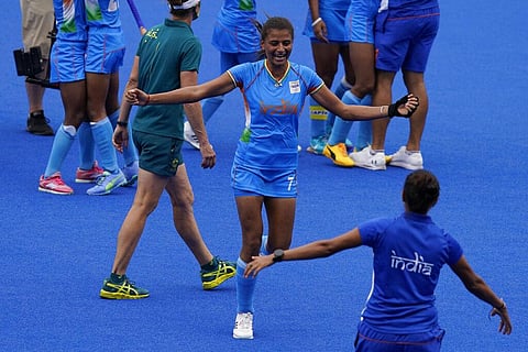 India's Sharmila Devi (7) celebrates with her teammates after winning their women's field hockey match against Australia at the 2020 Summer Olympics. (Photo | AP)