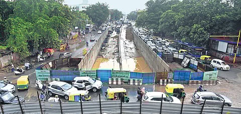 Construction work for the Ashram Construction work for the Ashram underpass got stalled due to the Covid-19 lockdown and subsequent shortage of labourers, throwing traffic out of gear at the busy inte