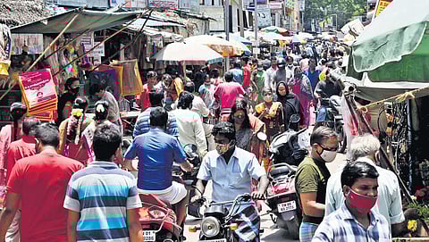 A crowd thronging Ayanavaram market in Chennai. (Photo | P Jawahar, EPS)