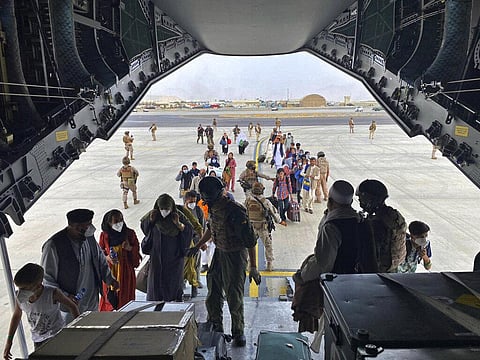 People board a Spanish airforce A400 plane as part of an evacuation plan at Kabul airport in Afghanistan. (Photo | AP)