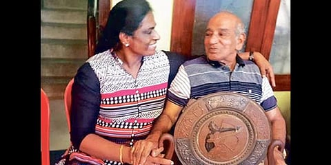 Veteran athletics coach OM Nambiar (right) with PT Usha