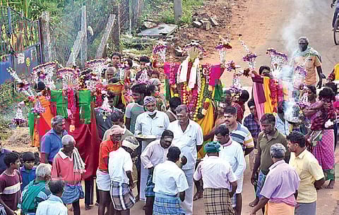 Hindu residents of Kasavalanadu Pudur take out a procession on Friday for Muharram festival | Express