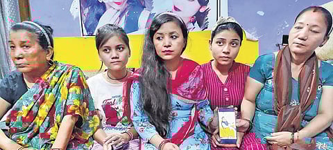 Family members of Jeet Bahadur Singh, a youth stranded in Afghanistan, at their home in UP’s Shajahanpur | PTI