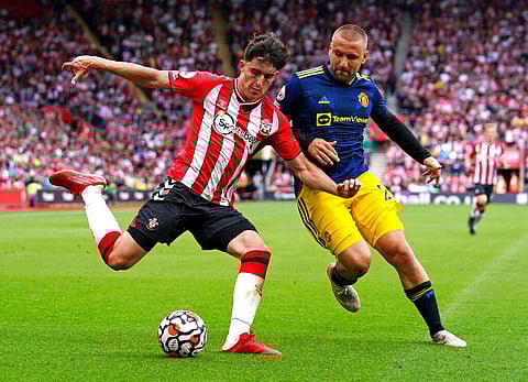 Southampton's Tino Livramento, left, and Manchester United's Luke Shaw during their English Premier League soccer match, Sunday, Aug 22, 2021. (Photo | AP)