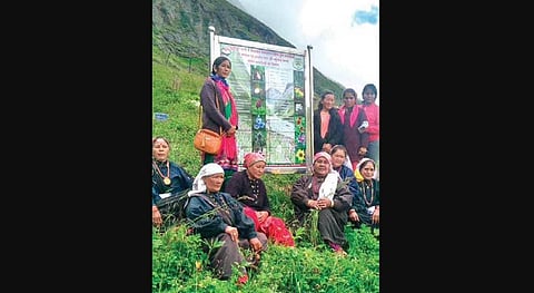 Locals and officials at inauguration of herbal garden in Mana village. (Photo | Express)