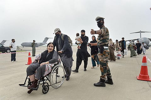 India on Sunday brought back 392 people, including two Afghan lawmakers, in three different flights as part of the mission to evacuate its nationals and Afghan partners from Kabul in the backdrop of increasing hostilities by the Taliban and deteriorating security situation in the city after it fell to the militant outfit a week back. Photo | AP)