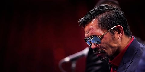 Manny Pacquiao, of the Philippines, attends a news conference after his loss to Yordenis Ugas, of Cuba, in a welterweight championship boxing match in Las Vegas. (Photo | AP)