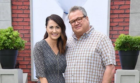 Actor Eric Stonestreet and partner Lindsay Schweitzer (Photo | AFP)