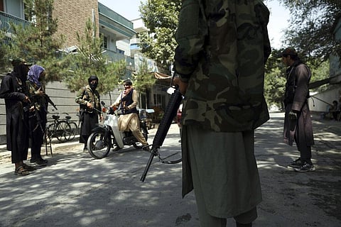 Taliban fighters stand guard at a checkpoint in the Wazir Akbar Khan neighborhood in the city of Kabul, Afghanistan. (Photo | AP)