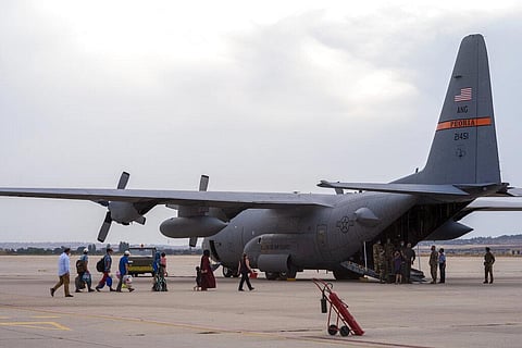 Right after they arrive in Italy, evacuees are issued humanitarian visas and are tested for COVID-19. (Photo | AP)