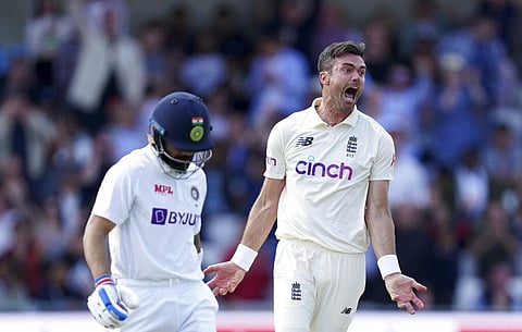 England's James Anderson, right, celebrates the dismissal of India's captain Virat Kohli, left, during the first day of third test cricket match between England and India. (Photo | AP)