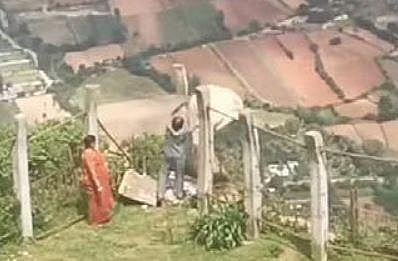 A video that has gone viral shows KSTDC employee dumping garbage down the cliff | Express