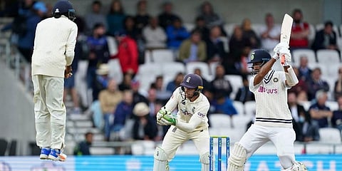 Cheteshwar Pujara (R), bats during the third day of third test match between England and India, at Headingley, Leeds, England, Aug 27, 2021. (Photo | AP)