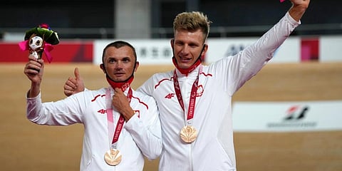 Tokyo Paralympics medalist Marcin Polak of Poland (L) | AP
