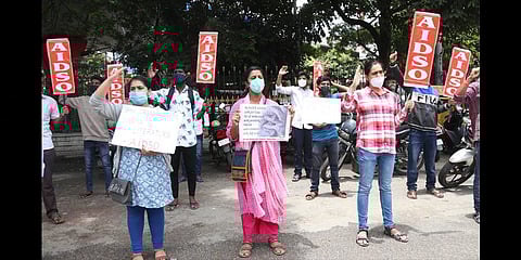 Members of the All-India Democratic Students Organisation protest against increasing crimes against women, in Bengaluru on Saturday | EXPRESS