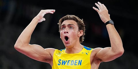 Armand Duplantis, of Sweden, celebrates after winning the gold medal in the men's pole vault final at the 2020 Summer Olympics in Tokyo. (Photo | AP)