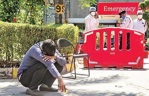 Relative of a patient at Delhi’s Jaipur Golden Hospital, where 21  Covid-19 patients died on the intervening night of April 23 and 24. (File Photo | PTI)