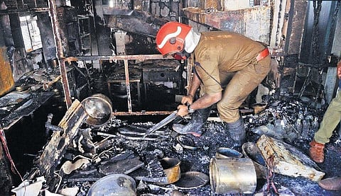 Fire & Rescue Services officer checks the gutted kitchen of SP Fort Hospital. According to officials, a short circuit in the wiring of a fan at the hospital kitchen led to accident| Vincent P