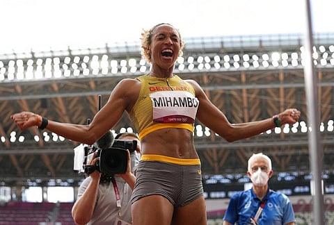 Malaika Mihambo, of Germany celebrates after winning the gold medal in the women's long jump final at the 2020 Summer Olympics. (Photo | AP)