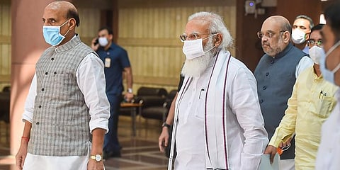 Prime Minister Narendra Modi with Defence Minister Rajnath Singh arrive to attend the BJP Parliamentary Party meeting, during the Monsoon Session of Parliament (Photo | PTI)