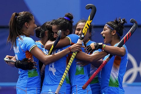 Team India celebrates after Gurjit Kaur scores during a women's field hockey match against Australia at the 2020 Summer Olympics. (Photo | AP)