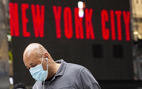 In this file photo a man wears a face mask in Midtown Manhattan in New York on July 29 2021. (Photo | AFP)