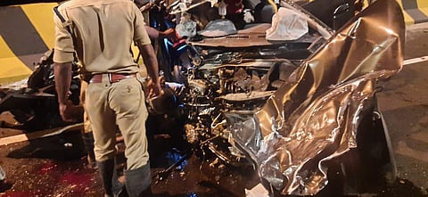 Rescue personnel retrieve bodies from mangled cars that were involved in the collision in Alappuzha bypass road on Tuesday. (Photo | Express)