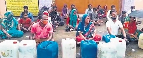 Locals staging protest over drinking water crisis in Erasama. (Photo | Express)
