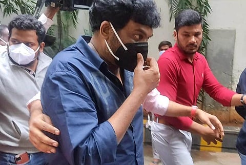 Telugu film director Puri Jagannadh arrives at the ED office in Hyderabad to appear before the agency officials in connection with a drugs case. (Photo | Express)