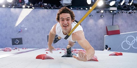 Adam Ondra, of the Czech Republic, participates during the speed qualification portion of the men's sport climbing competition at the 2020 Summer Olympics in Tokyo, Japan. (Photo | AP)